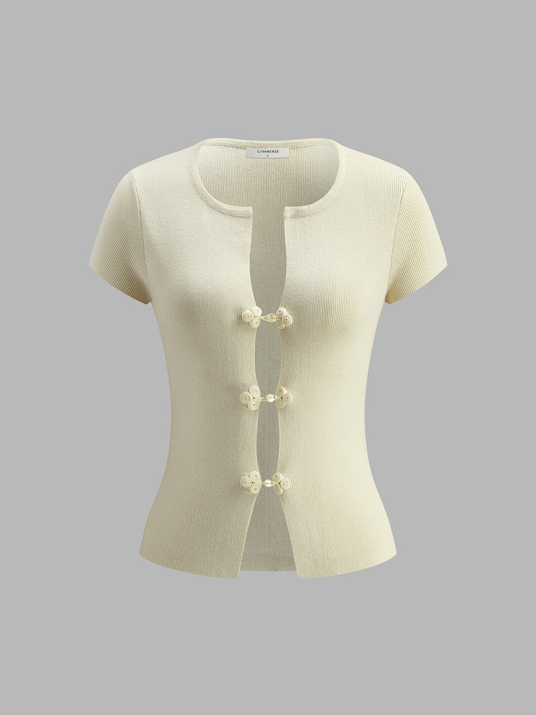 Şık Düğme Aksanlarıyla Riblendirilmiş Triko Üst