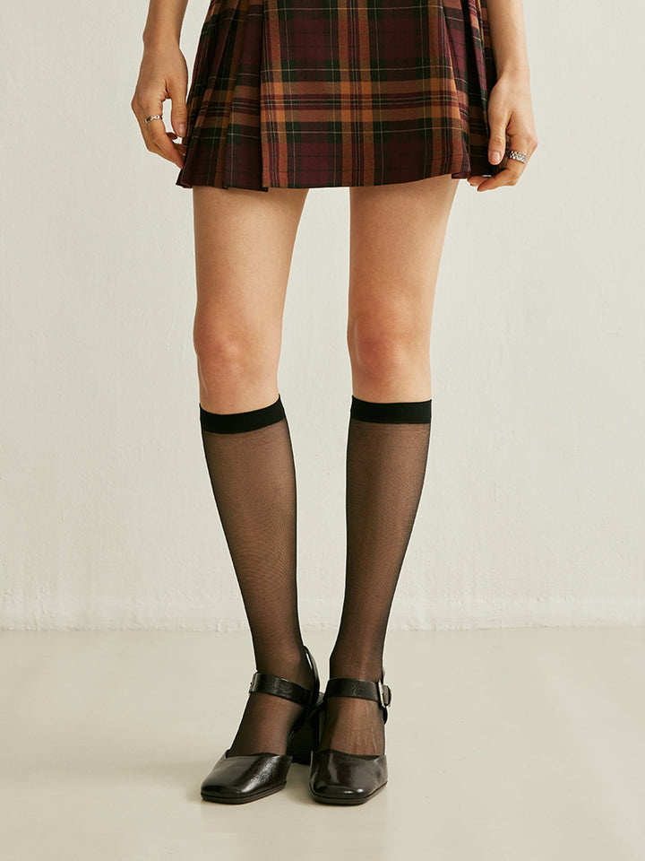 Çarpıcı Bir Görünüm İçin Sensasyonel Siyah File Diz Üstü Çoraplar