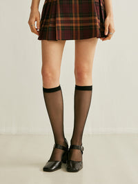 Çarpıcı Bir Görünüm İçin Sensasyonel Siyah File Diz Üstü Çoraplar