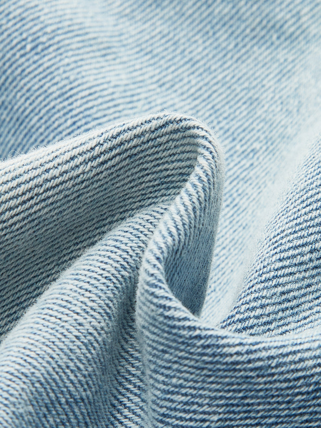 Asimetrik Bel Yıpranmış Jean Şort